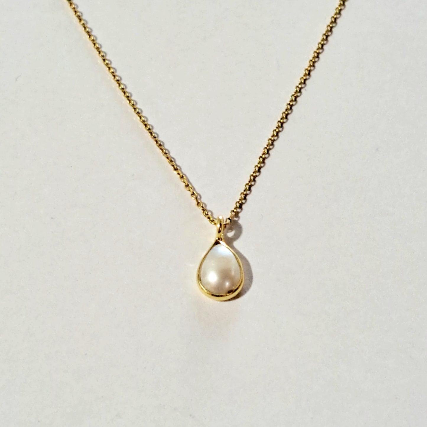Drop pearl and goldplated sterlingvsilver necklace