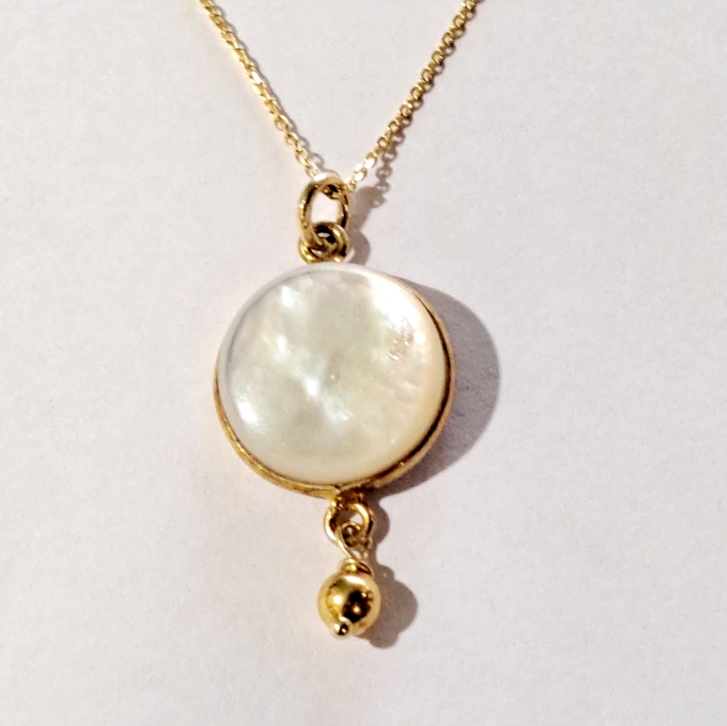 Handmade gold plated sterling silver necklace with mother of pearl.