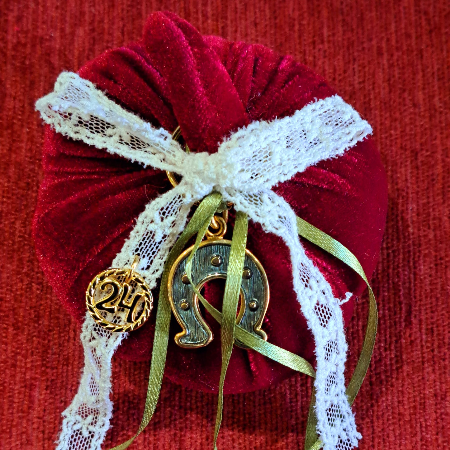 Red pumpkin with key chain, lucky charm 2024.