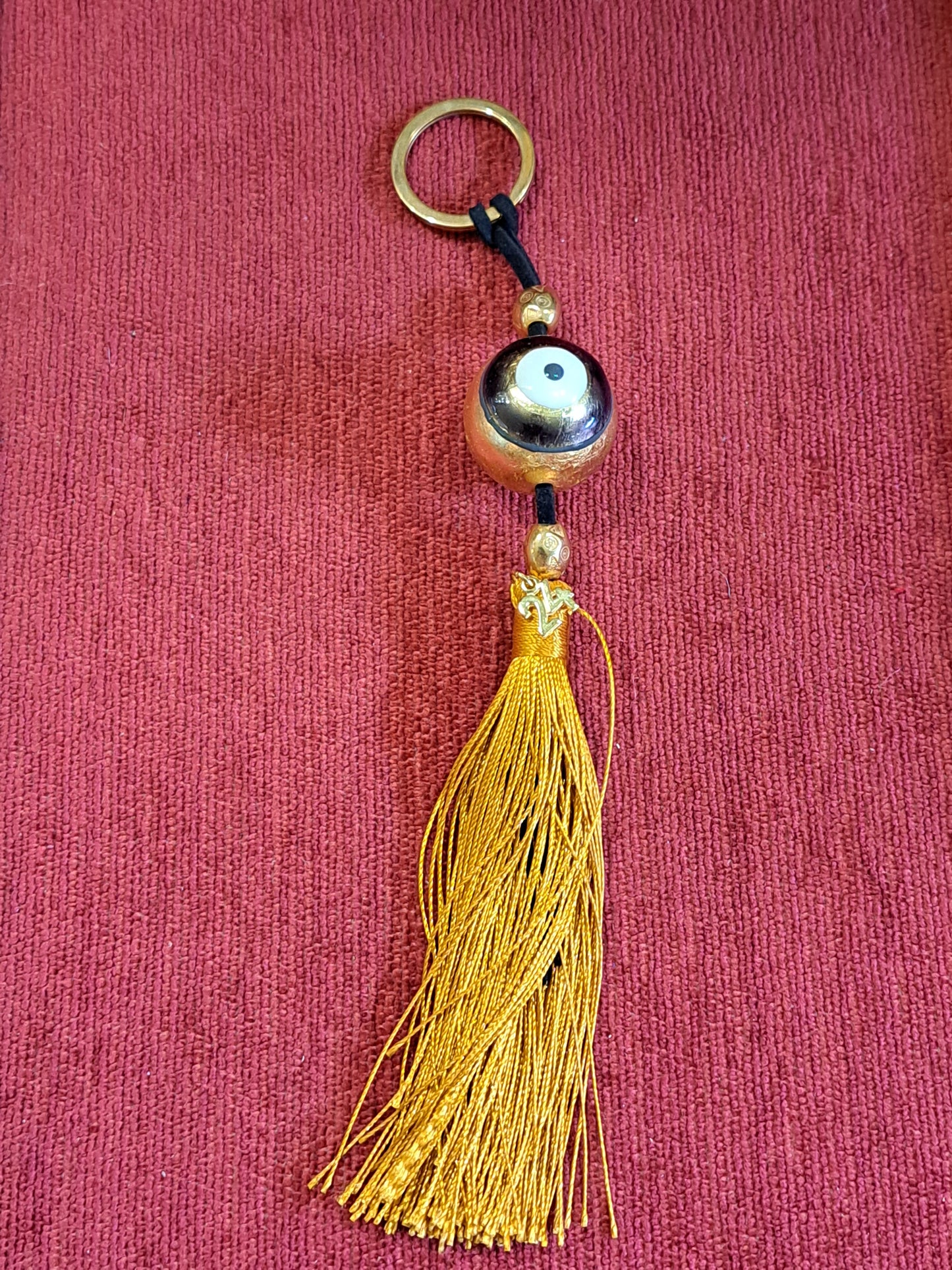 Key chain, golden evil eye 2024