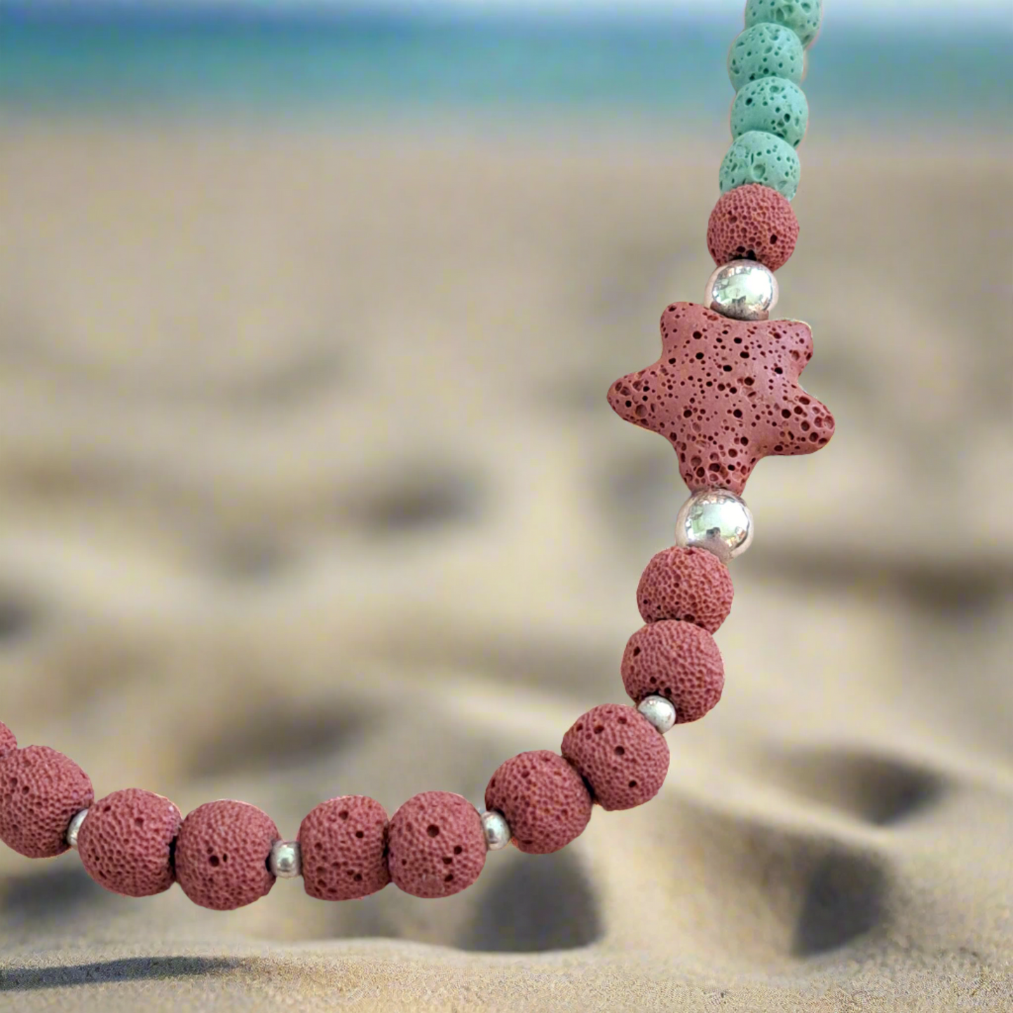 Handmade necklace with lava beads and sterling silver elements