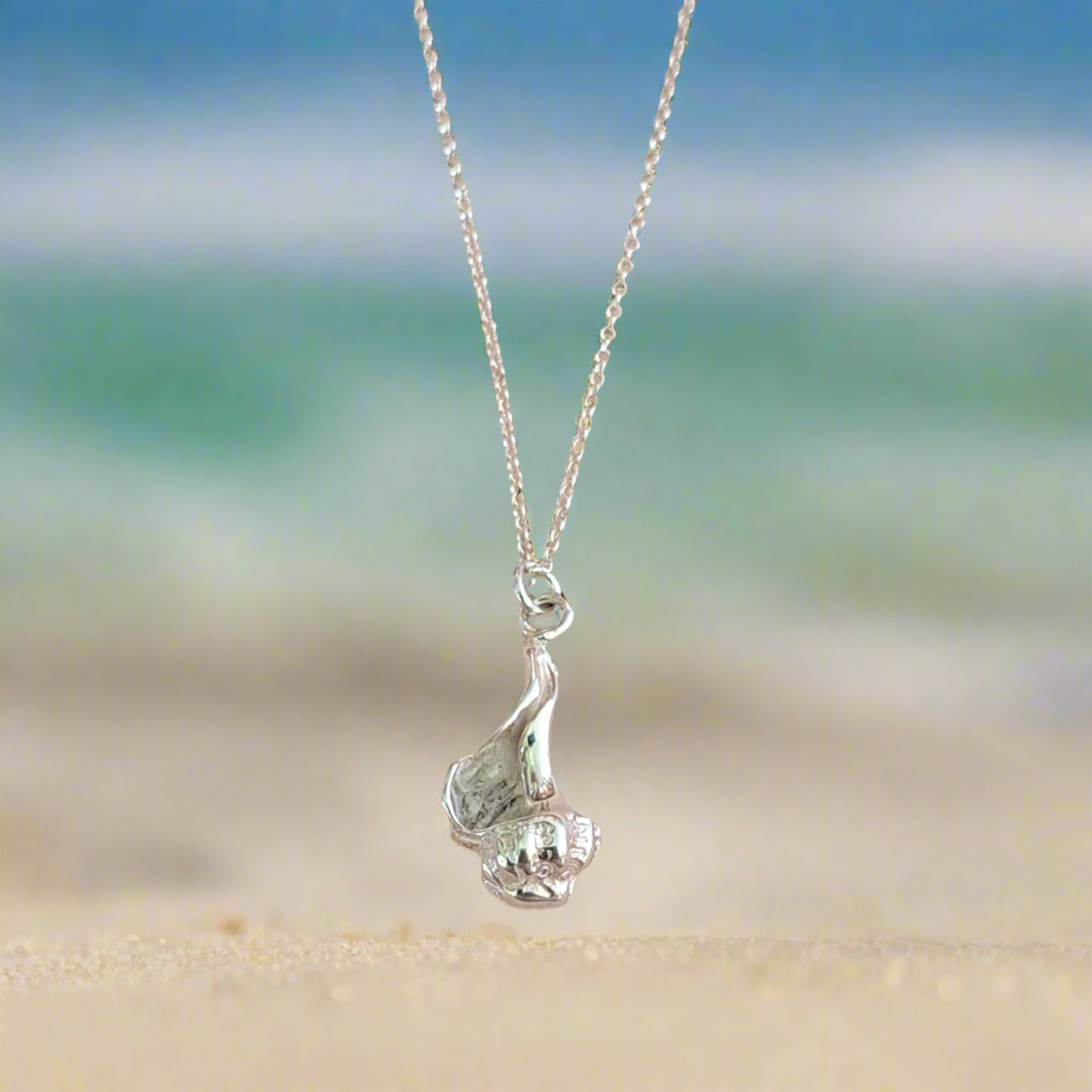 Sterling silver long conch shell - Katerina Roukouna