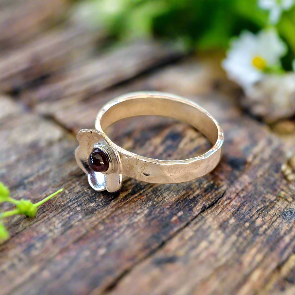 Flower with garnet, sterling silver ring