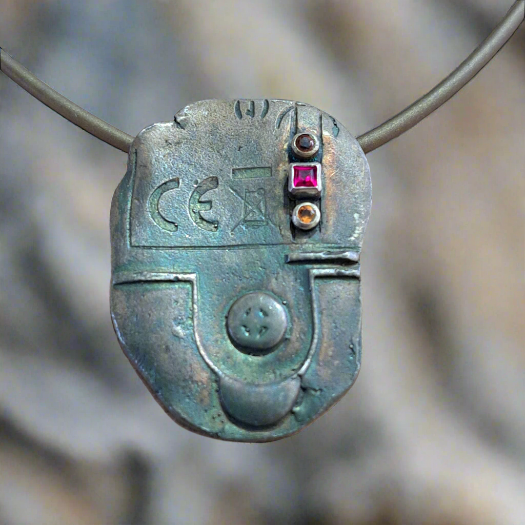 Handmade sterling silver necklace with precious gems
