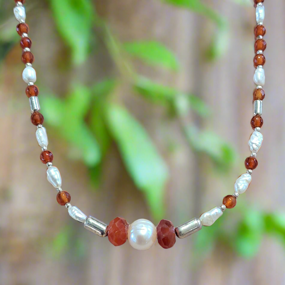 Handmade necklace with pearls,cornelins and silver.