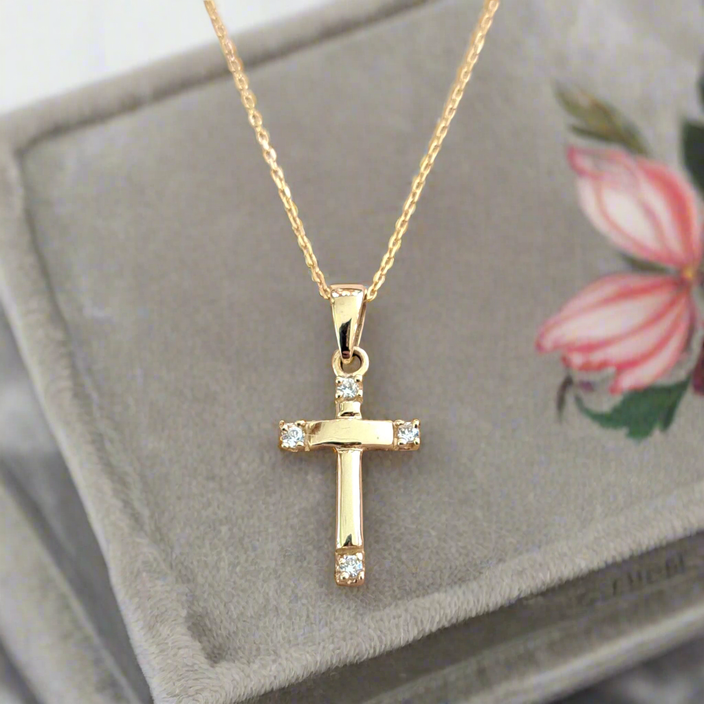 14K Gold elegant cross with zirkons