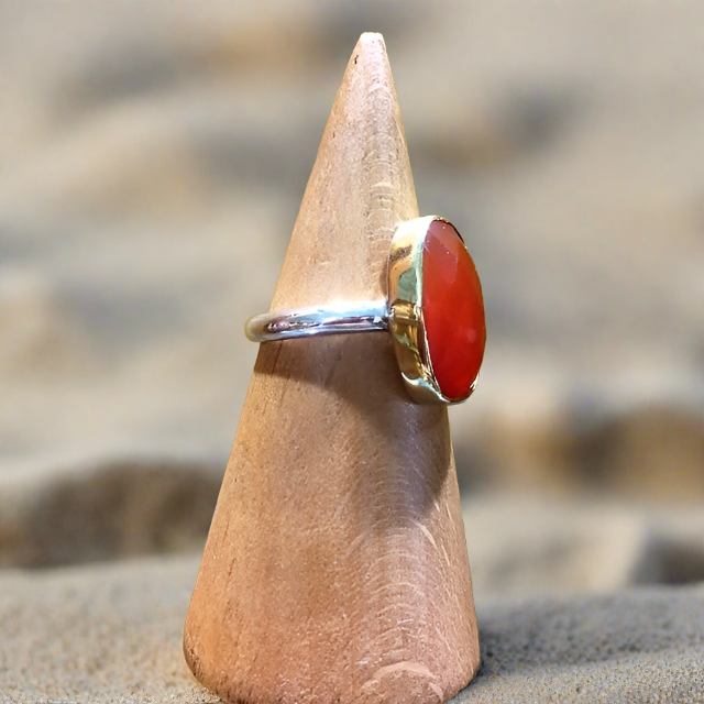 Handmade sterling silver ring with an oval cornelian setted with 18K gold