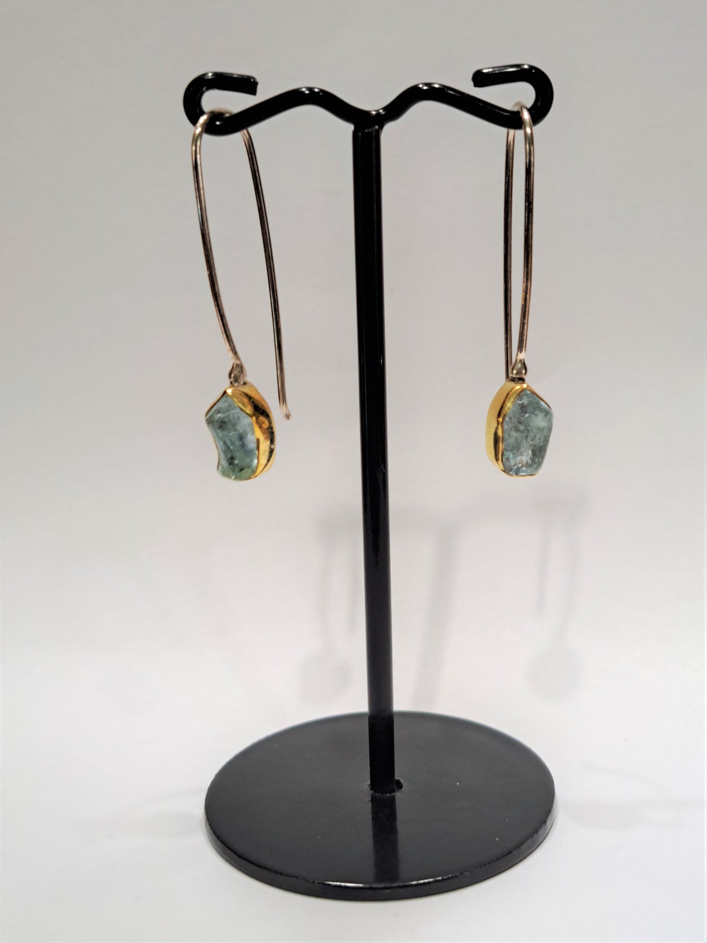 Handmade 18K gold and sterling silver long earrings with raw aquamarines