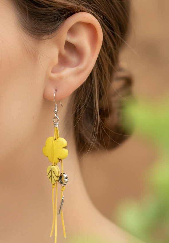 Handmade earrings with yellow haolites and metallic elements