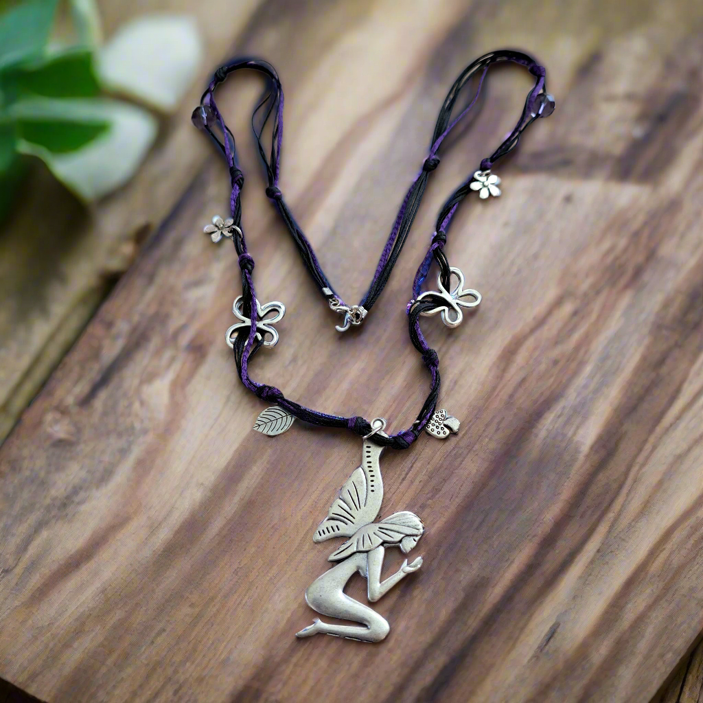 Handmade long necklace with a fairy