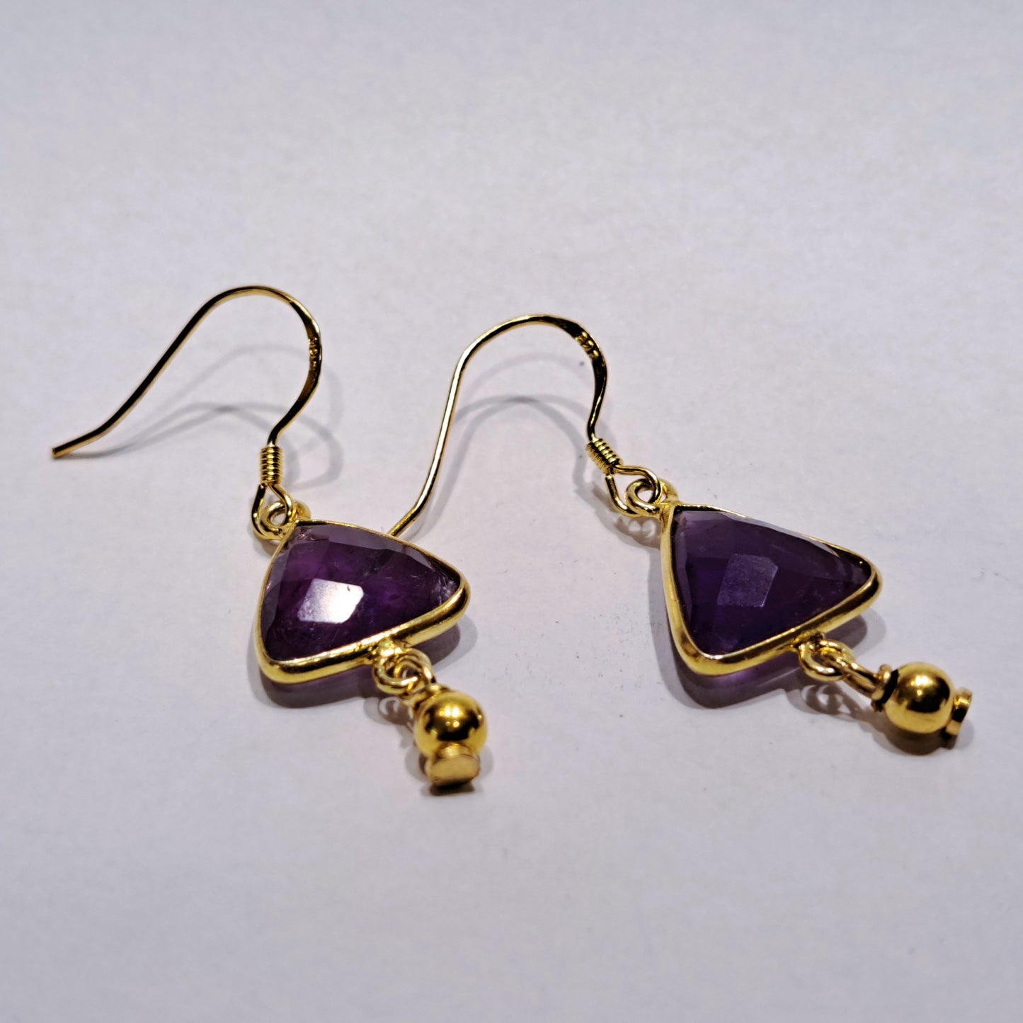 Handmade gold plated sterling silver earrings with trigonal amethysts