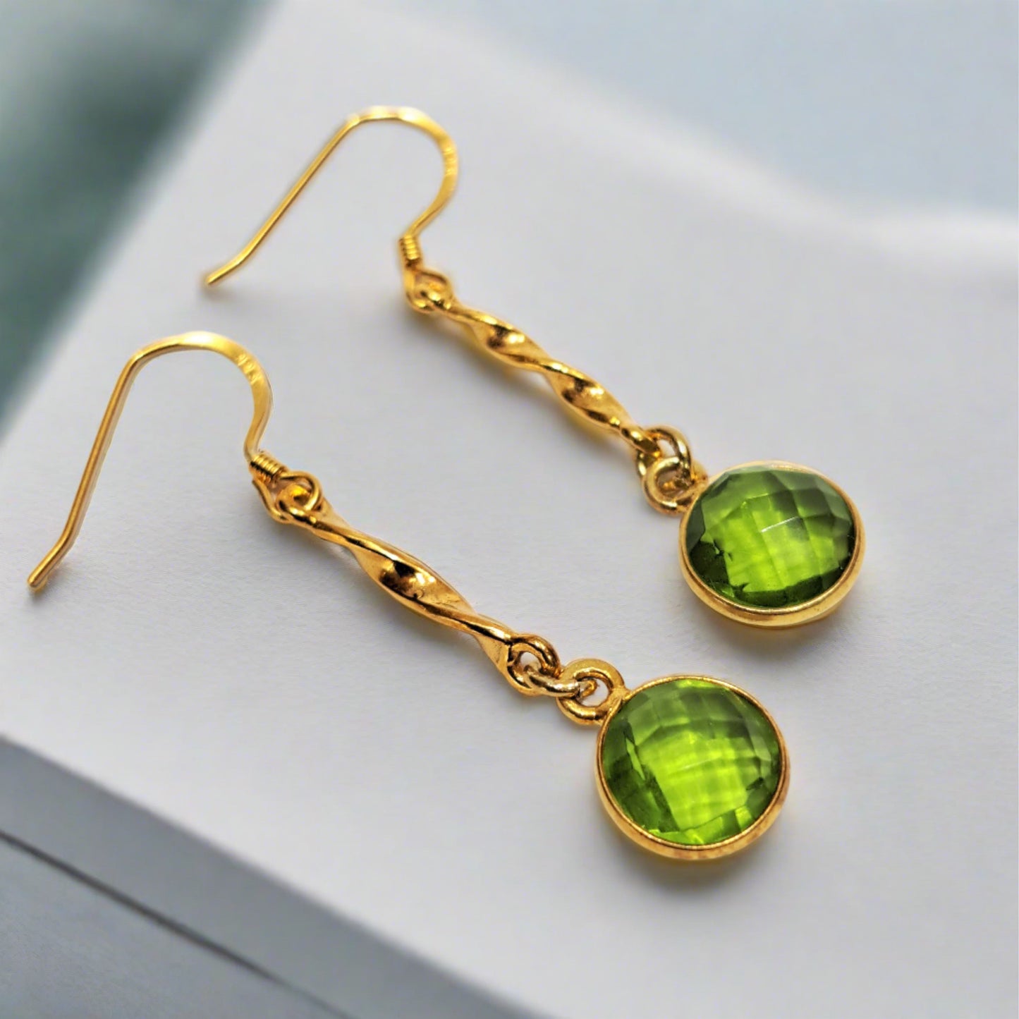 Handmade gold plated sterling silver earrings with peridots