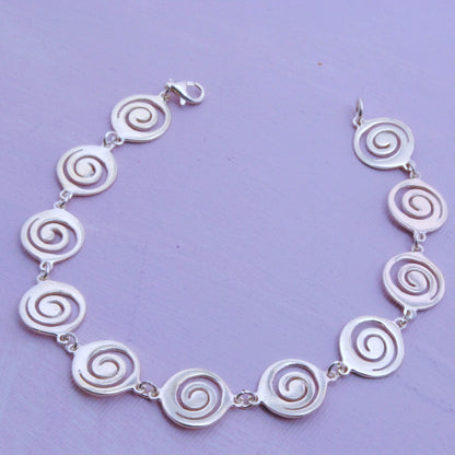 Sterling silver bracelets with spirals