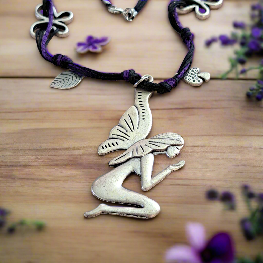 Handmade long necklace with a fairy