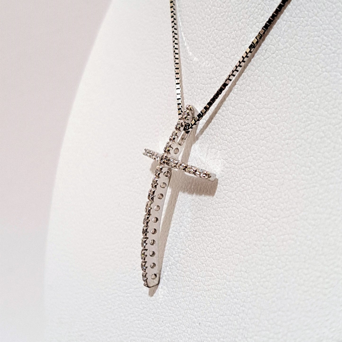14k White gold cross with zirkons