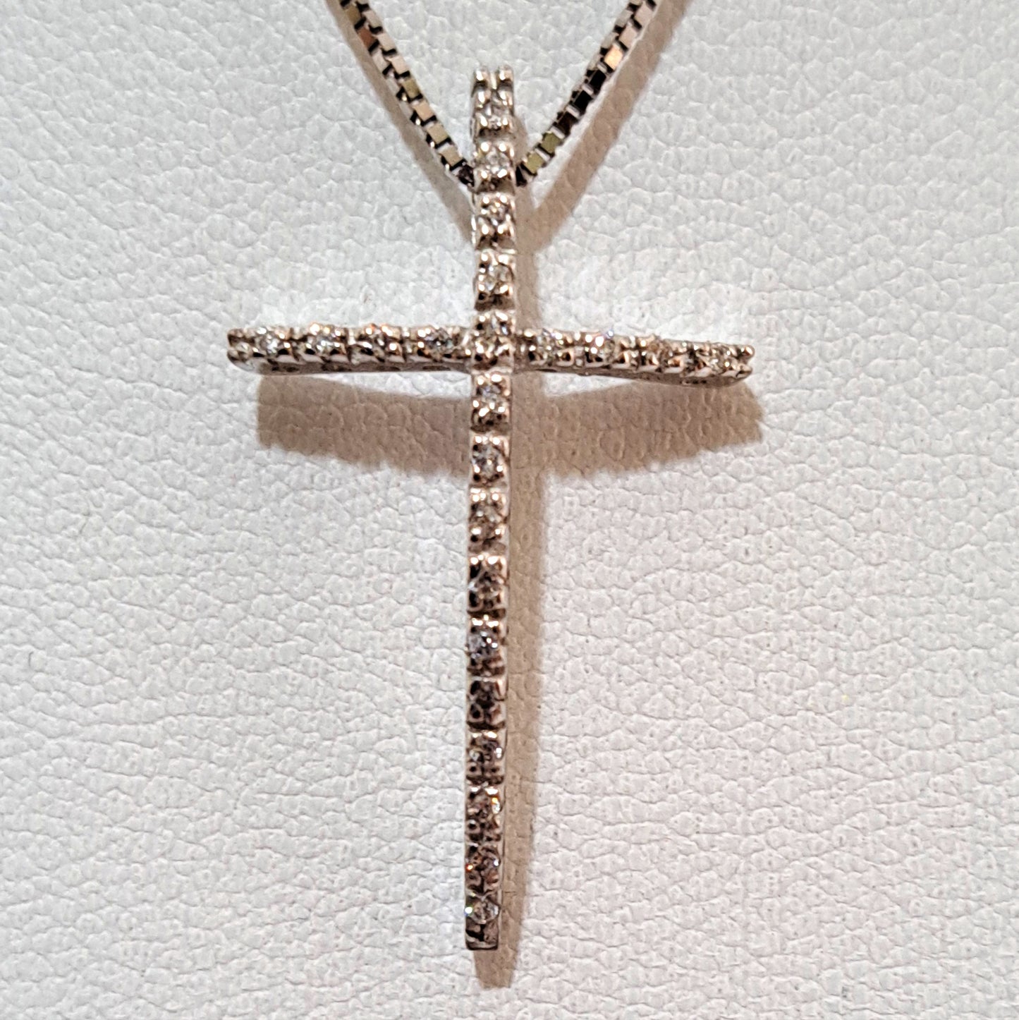 14k White gold cross with zirkons