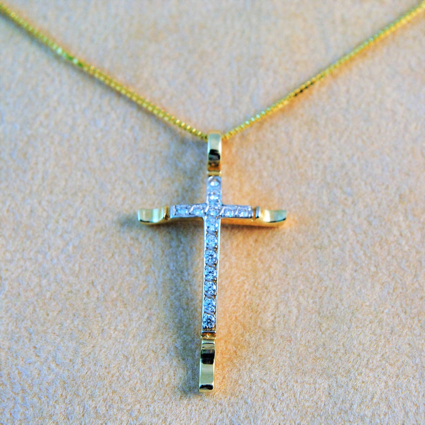 14K Gold cross with zirkons