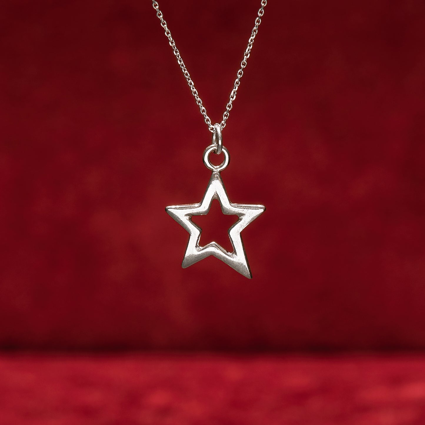 Tiny star pendant