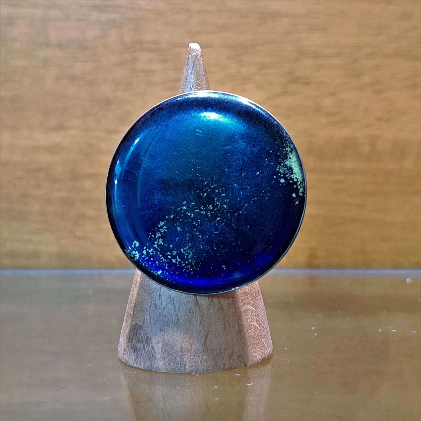 Handmade sterlingsilver and brass ring with blue enamel