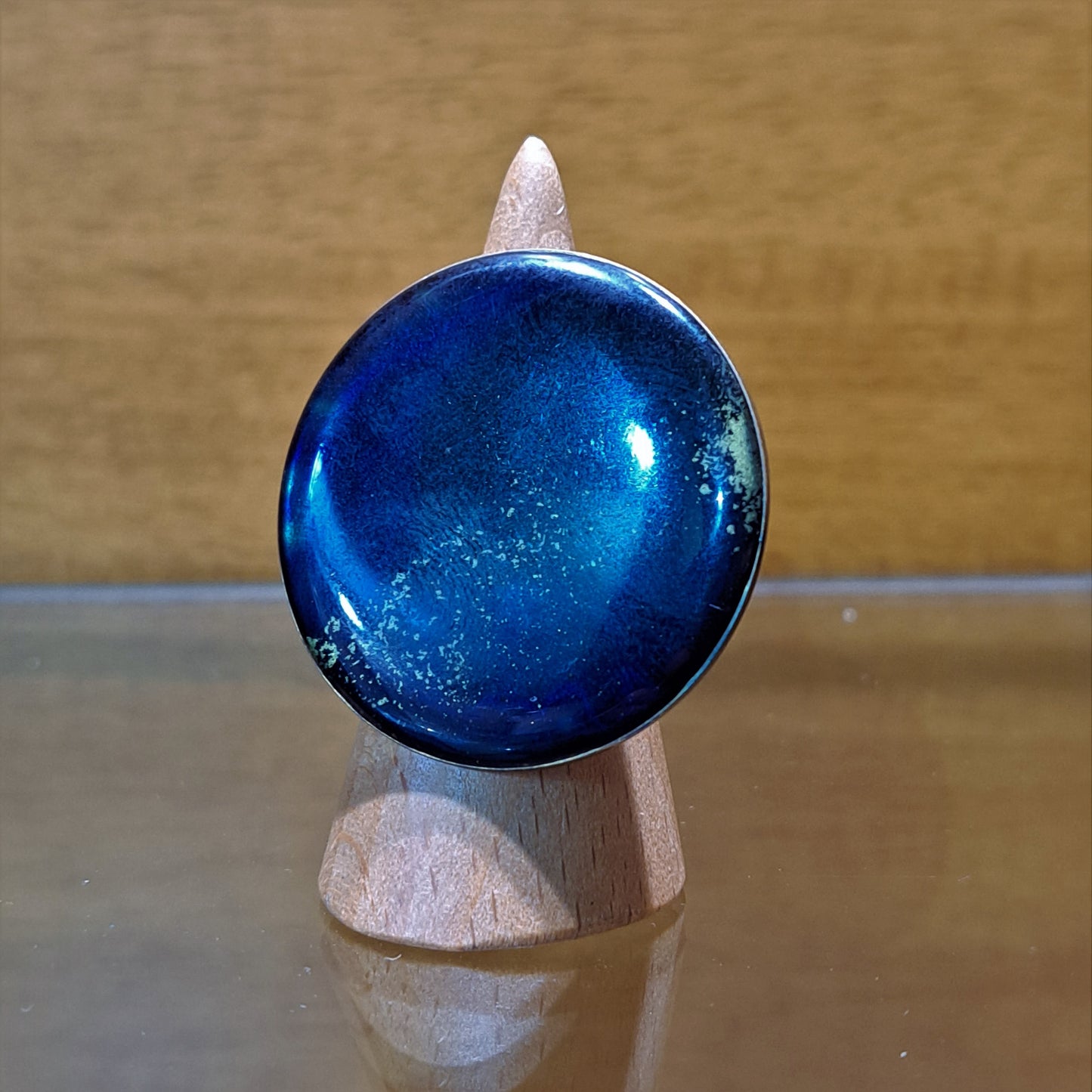Handmade sterlingsilver and brass ring with blue enamel
