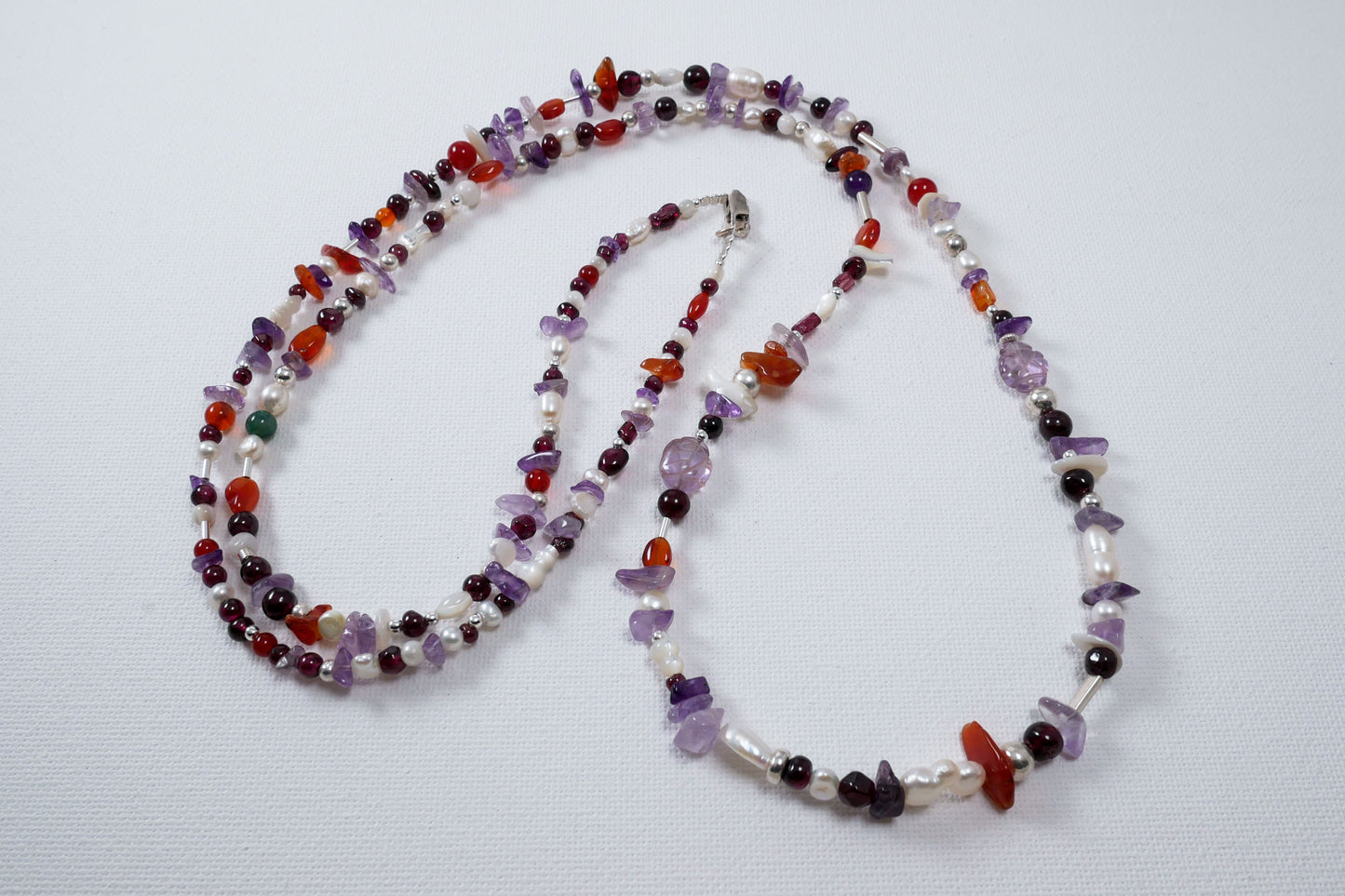 Handmade necklace with multi color gemstones and sterling silver