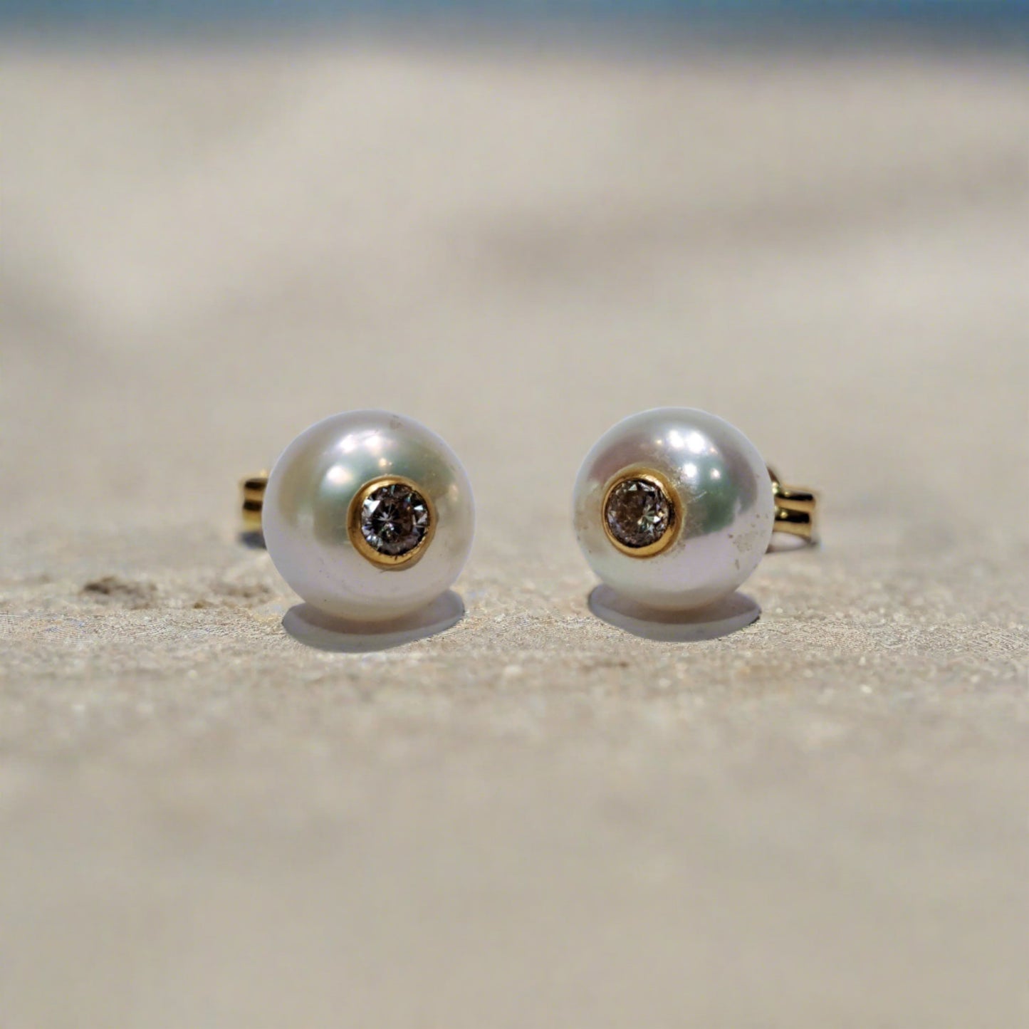 14K Gold earrings with pearls and zirkons