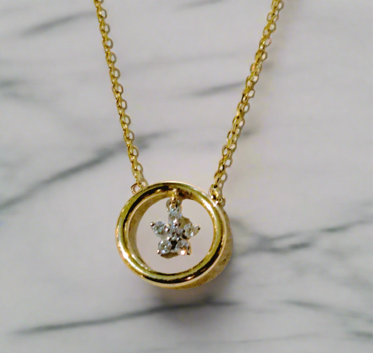 14K Gold necklace with a circle of life and a star