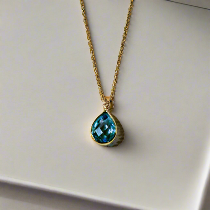 14K Gold necklace with blue zirkon drop