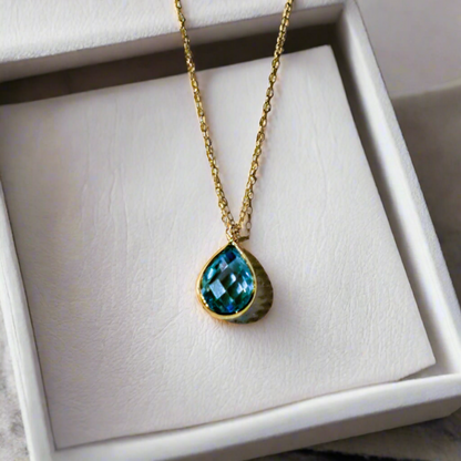 14K Gold necklace with blue zirkon drop