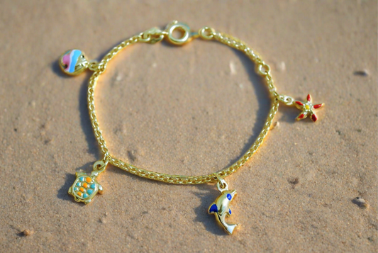 14k Gold baby bracelet with charms