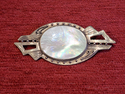 Handmade sterling silver brooch with oval mother of pearl