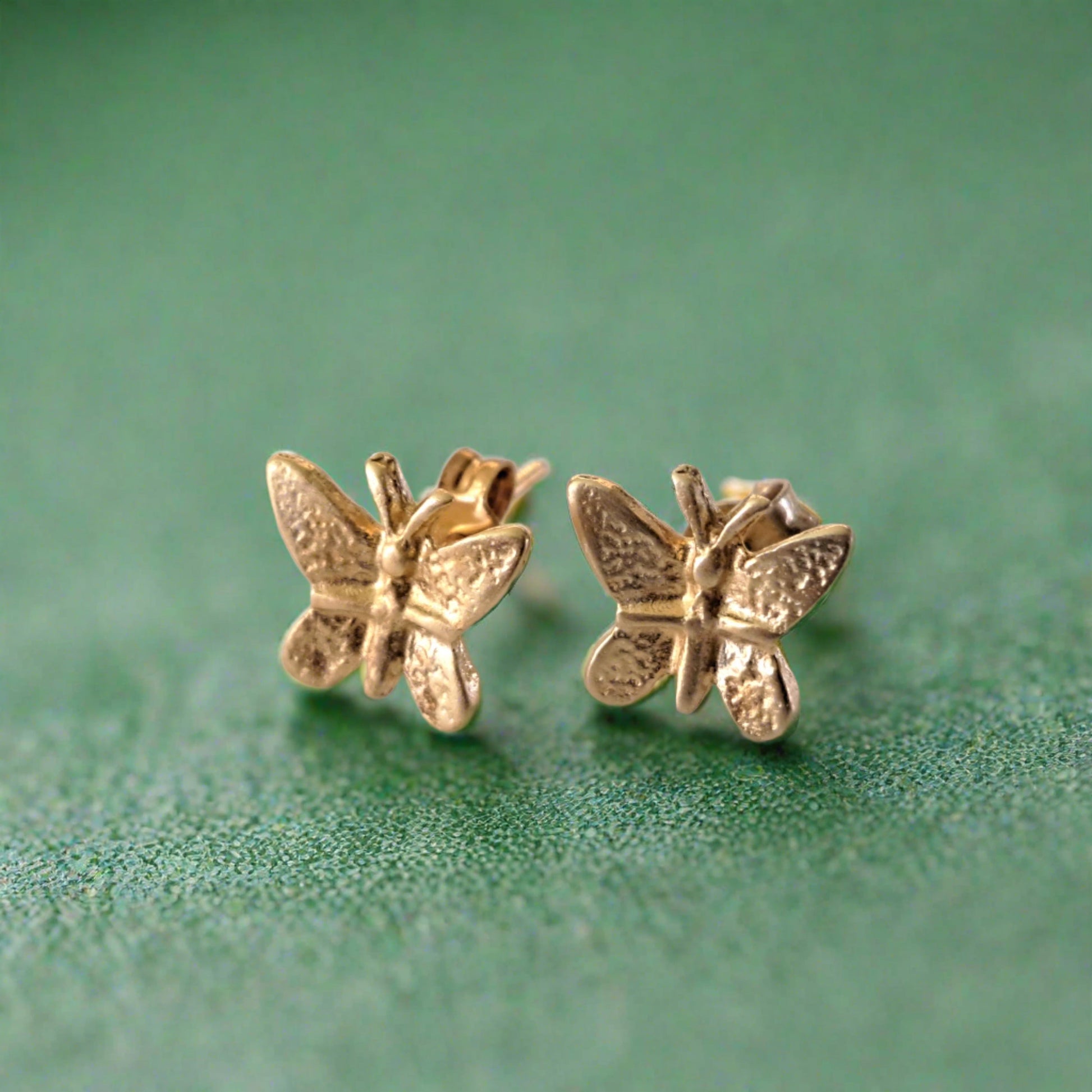 Butterflies gold pated stud earrings