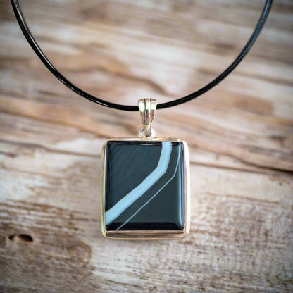 Sterling silver pendant with black and white onyx