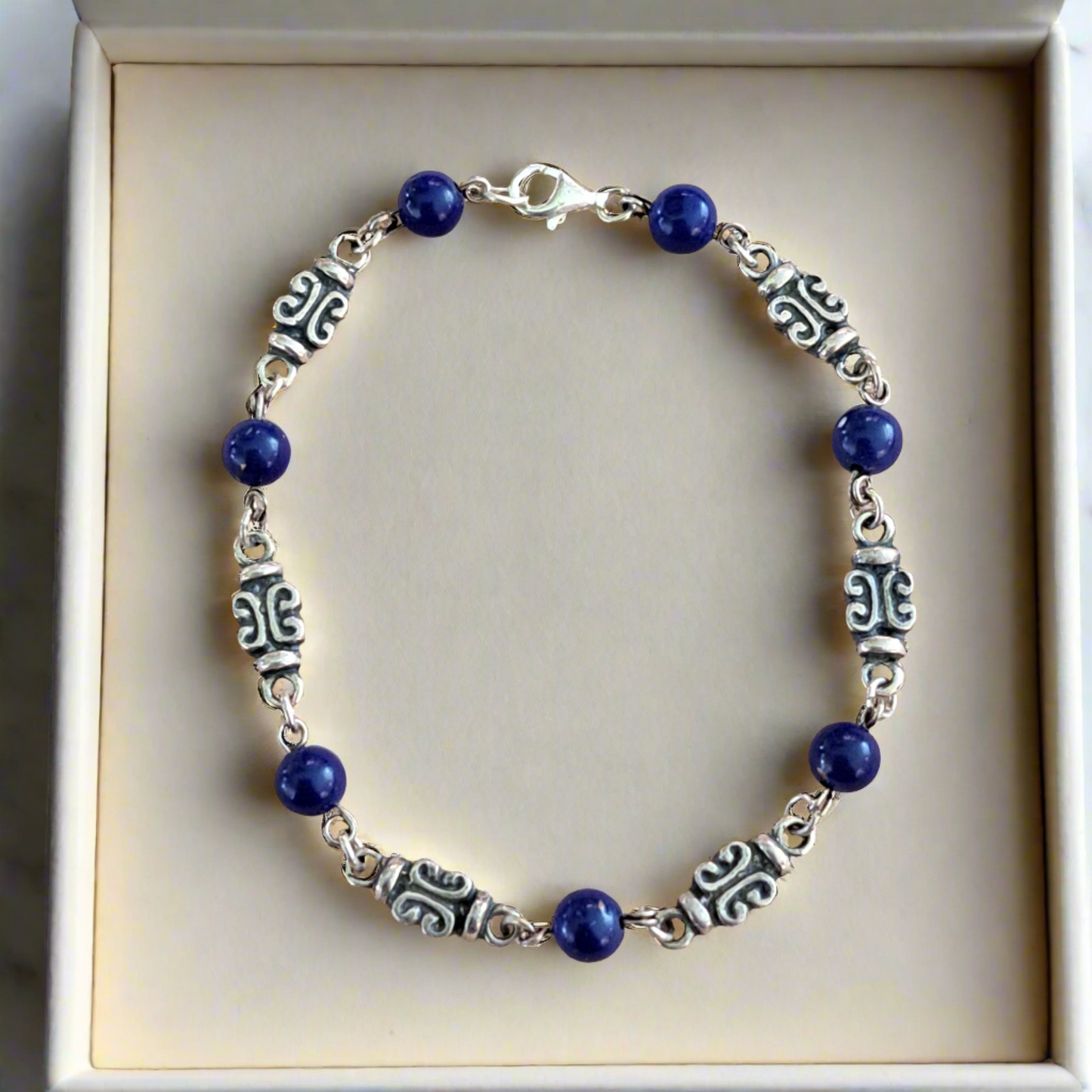 Handmade antique sterling silver bracelet with lapis lazouli.