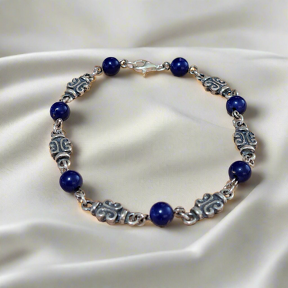 Handmade antique sterling silver bracelet with lapis lazouli.