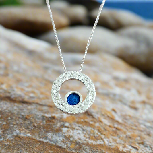 Round sterling silver necklace with blue enamel