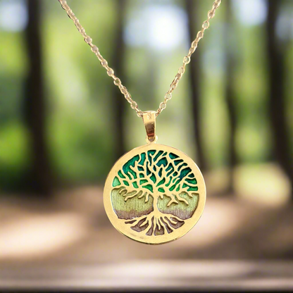 Gold plated sterling silver necklace with a round circle having inside the tree of life enamel plated with earthy colors