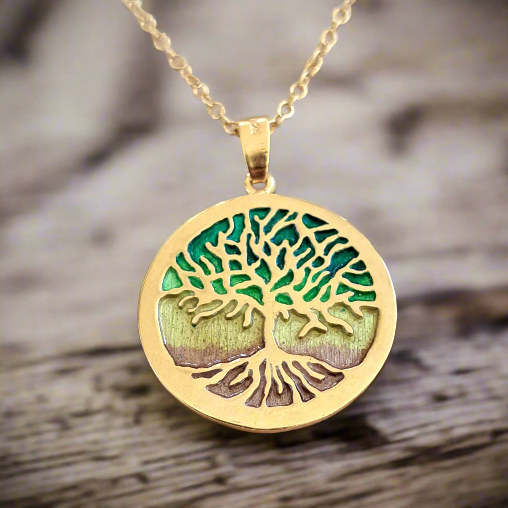 Gold plated sterling silver necklace with a round circle having inside the tree of life enamel plated with earthy colors