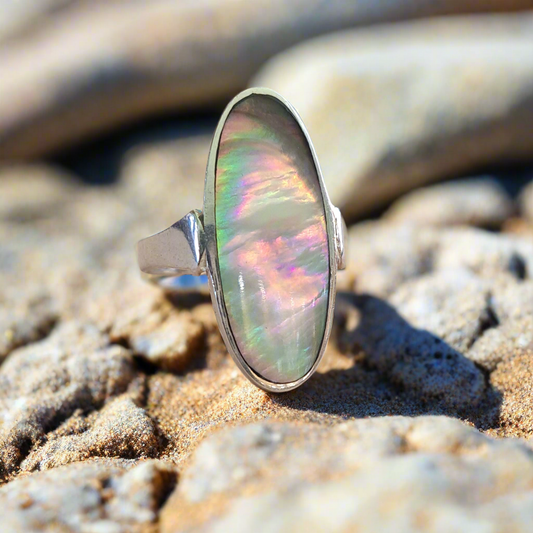 Sterling silver ring with an ova aboone shell with beautiful colours