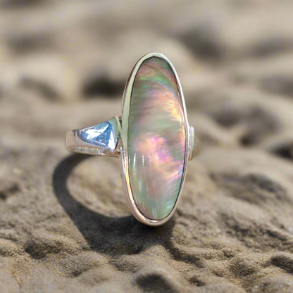 Sterling silver ring with an ova aboone shell with beautiful colours