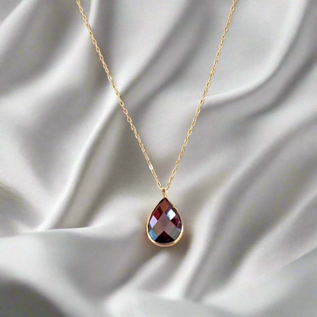 Gold necklace 14Κ with dark red zirkon drop