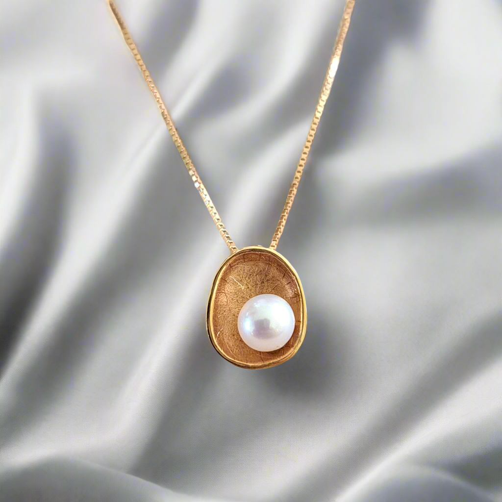 14K Gold necklace with  a round pearl