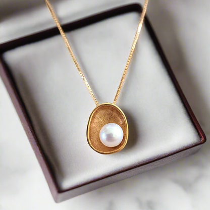 14K Gold necklace with  a round pearl