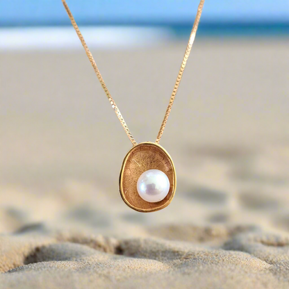 14K Gold necklace with  a round pearl