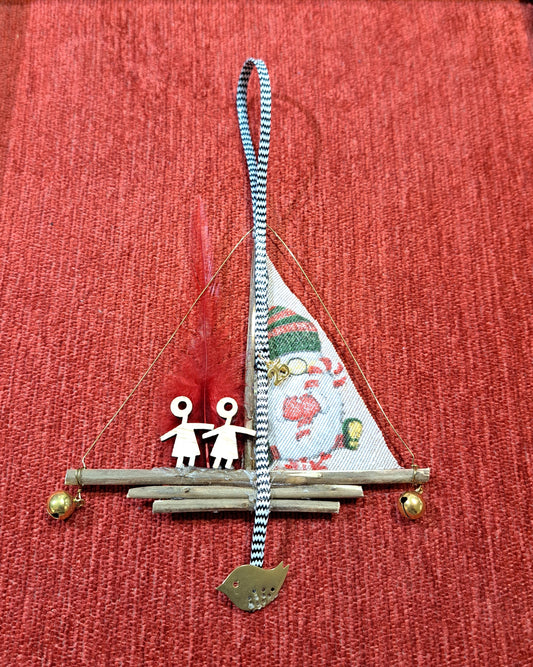 Handmade lucky charm of 2025. A boat with a couple.