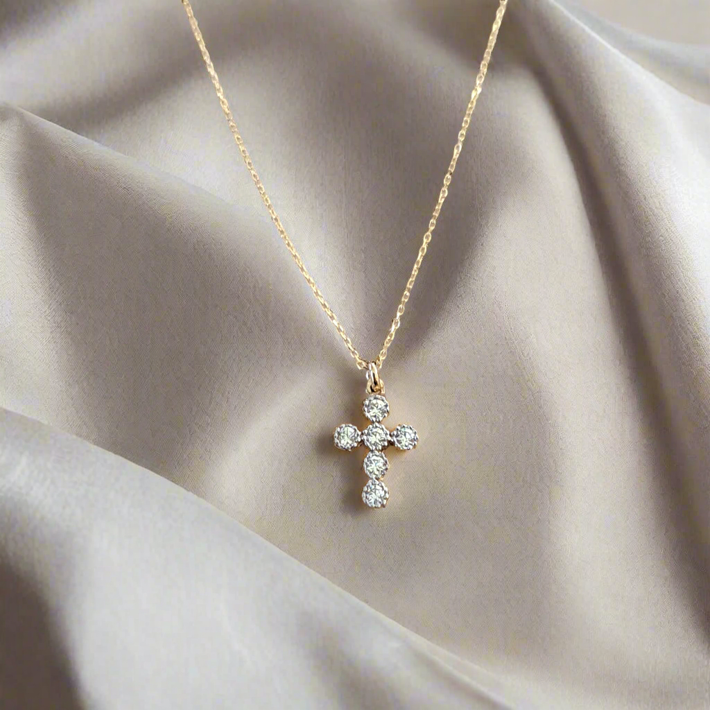 9K Gold cross with zirkons