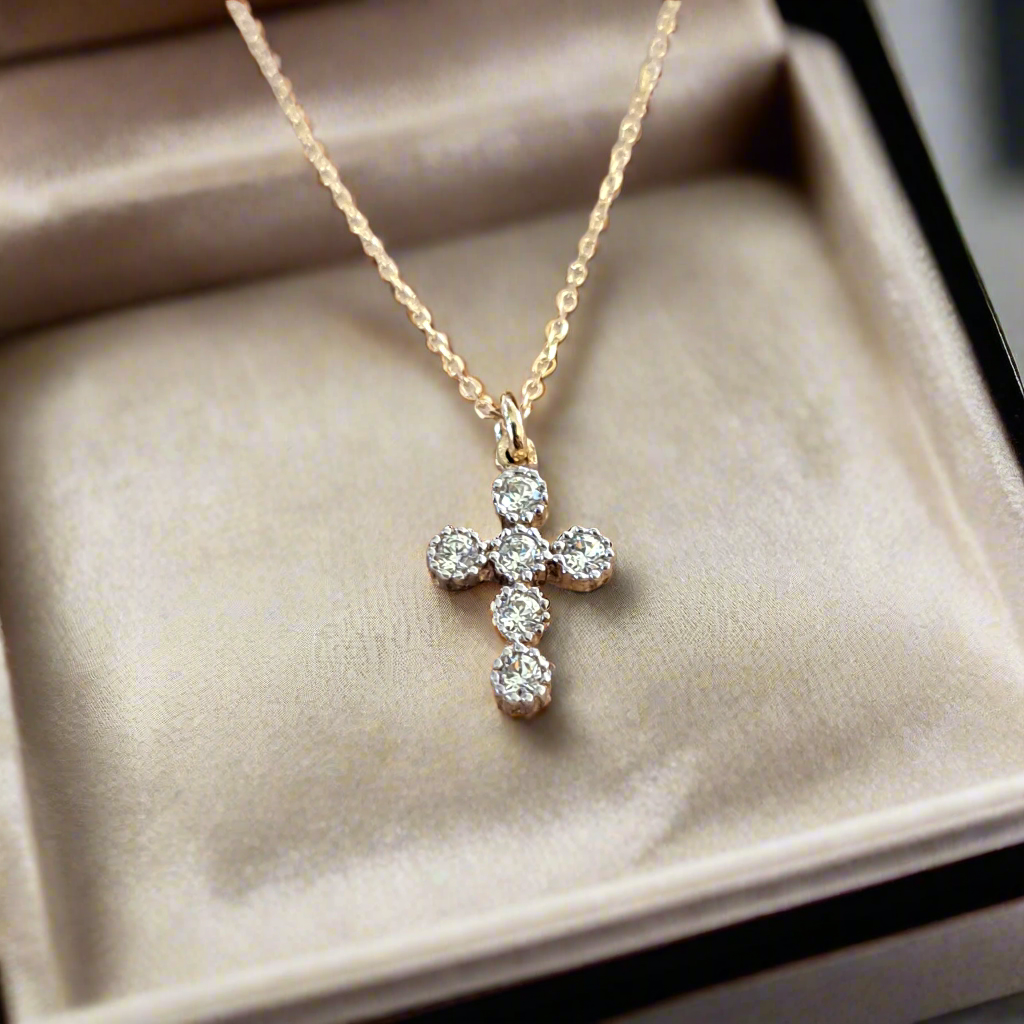 9K Gold cross with zirkons