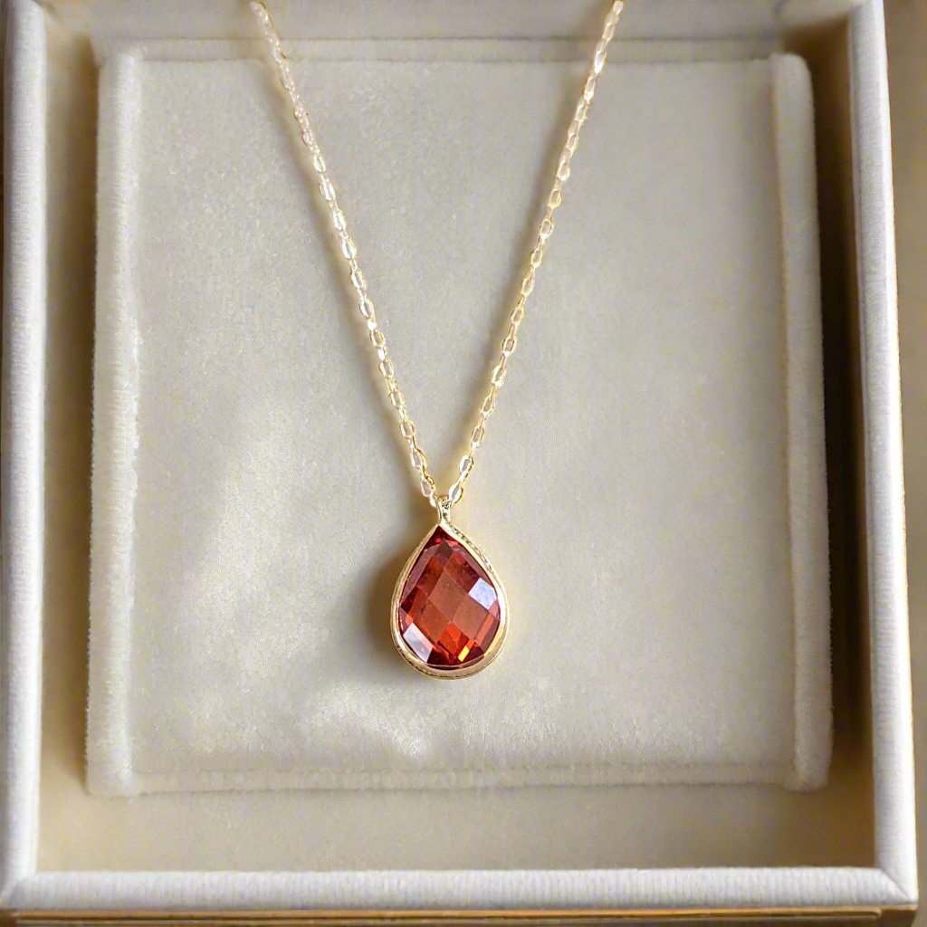 Gold necklace 14Κ  with red drop zirkon