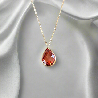 Gold necklace 14Κ  with red drop zirkon