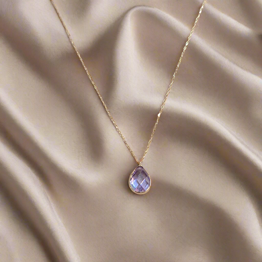 14K Gold necklace with purple zirkon drop